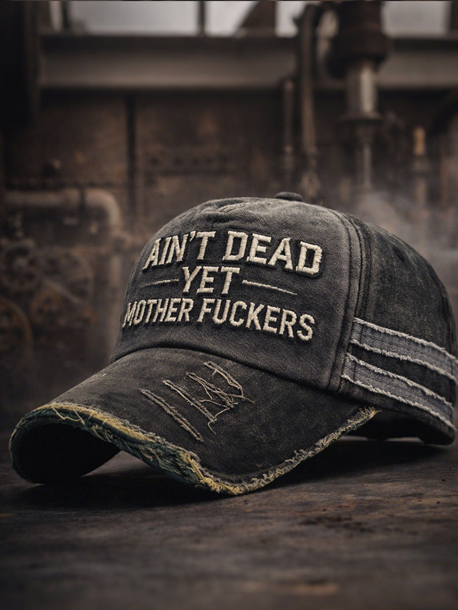 Ain't dead yet, motherfuckers Unisex hats