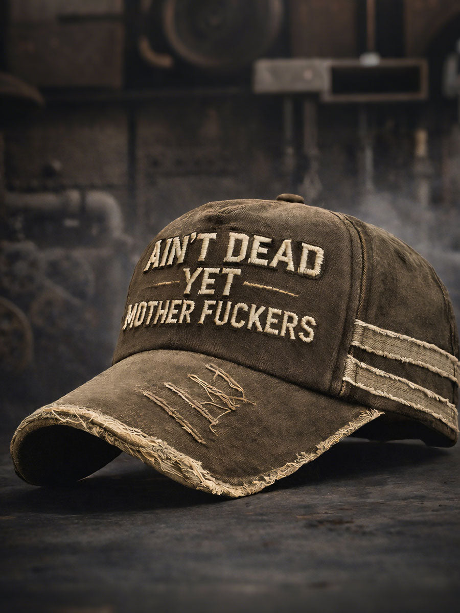 Ain't dead yet, motherfuckers Unisex hats